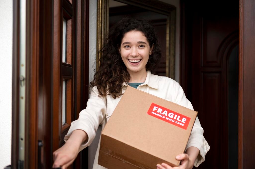 medium shot smiley woman holding box